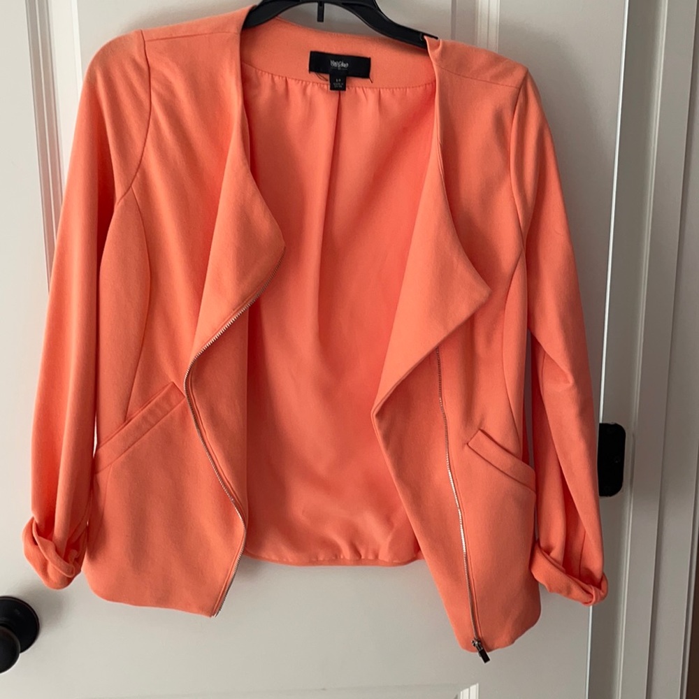 Light weight blazer with zipper detail. Peach color